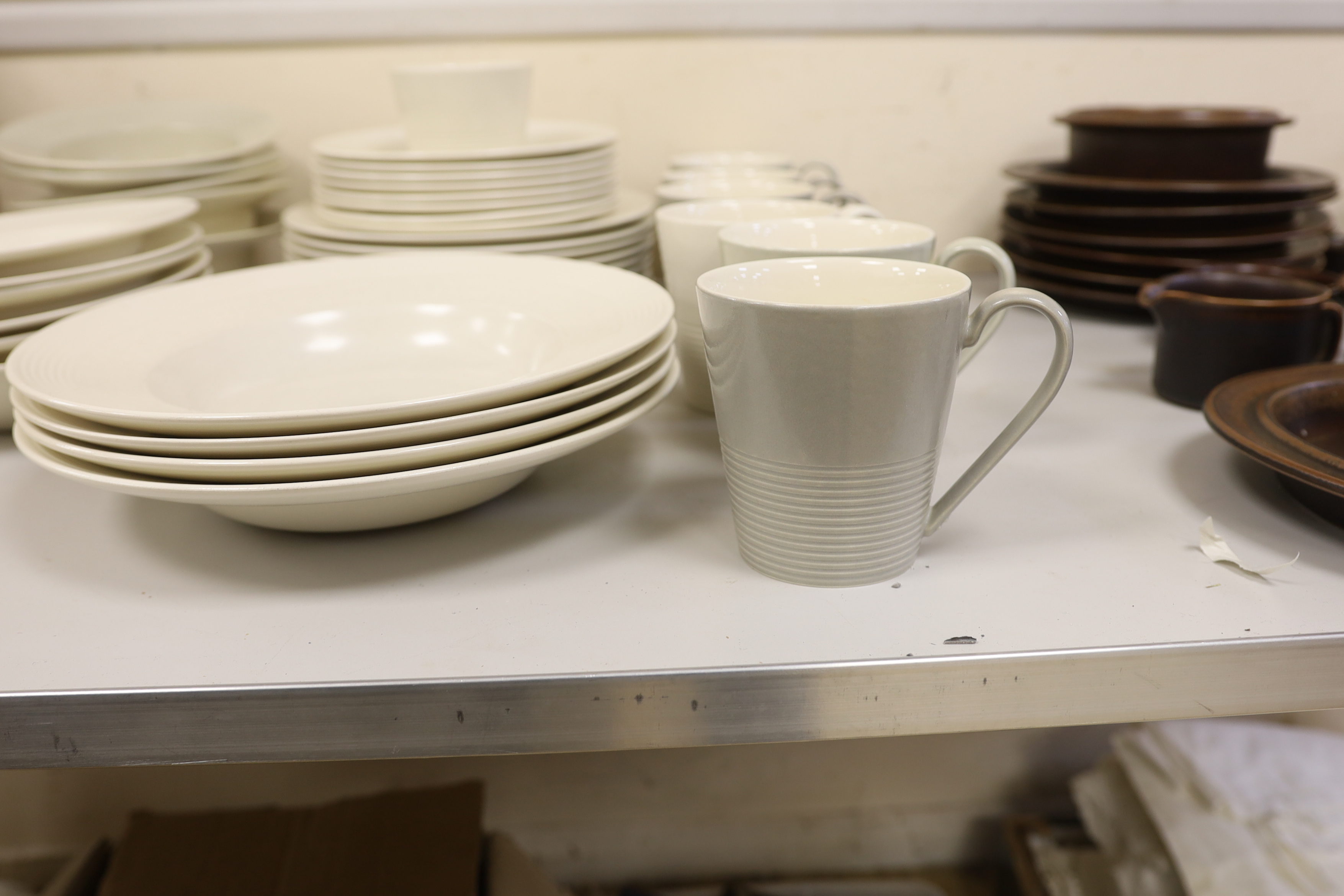 Paul Costelloe for Wedgwood, a part dinner set including six mugs, six bowls and eight dinner plates